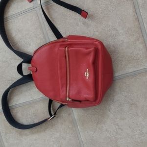 Small red leather Coach backpack
